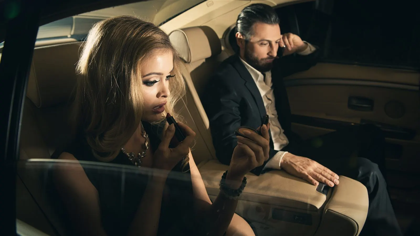 Executive passengers travelling by chauffeur in Paris