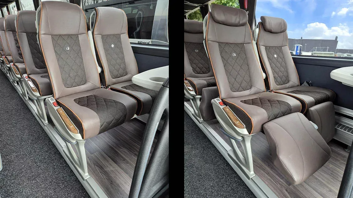 Luxury VIP coach interior with reclining leather seats
