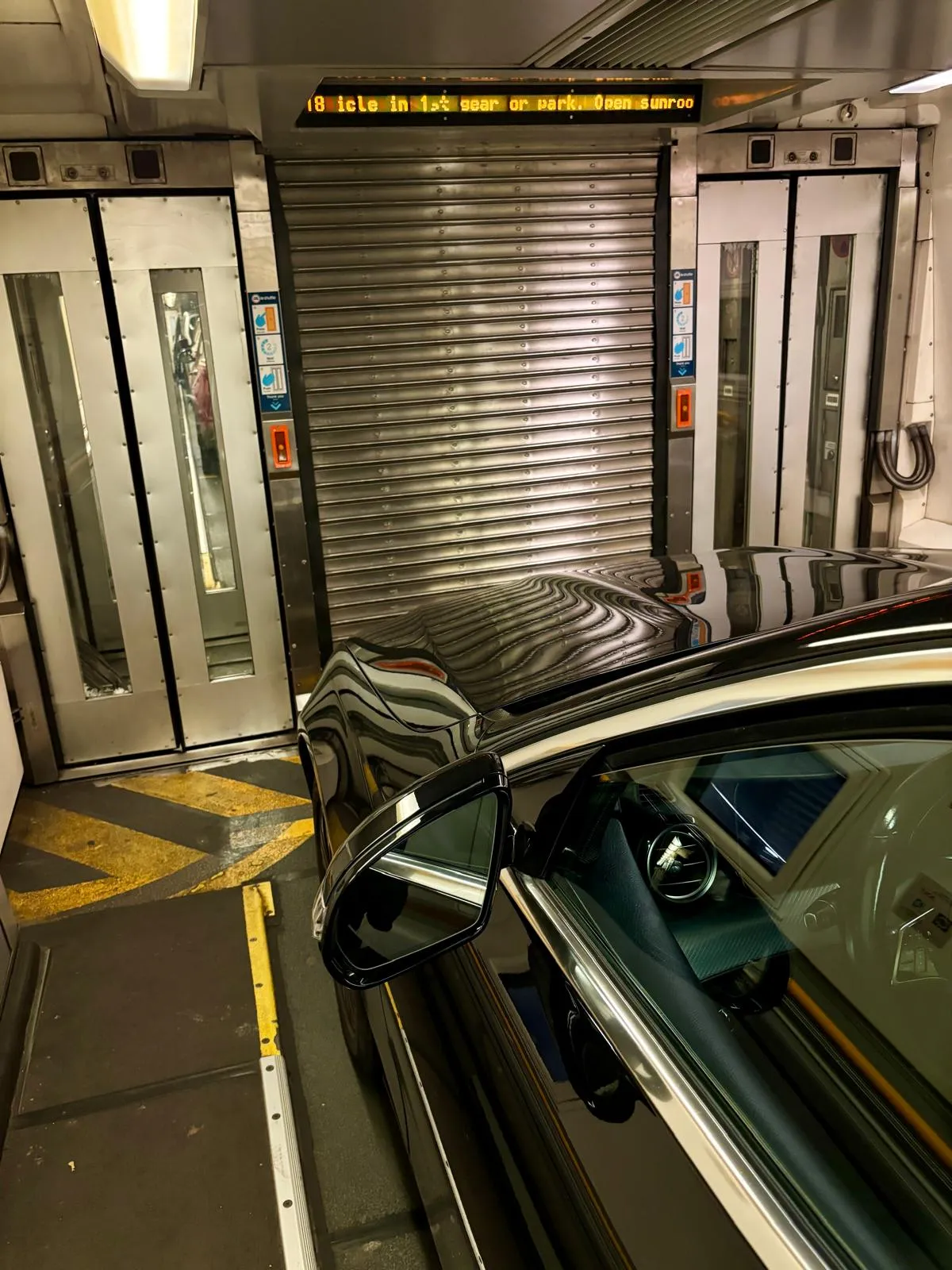 Inside the LeShuttle carriage with on-board instructions seen from the mirror