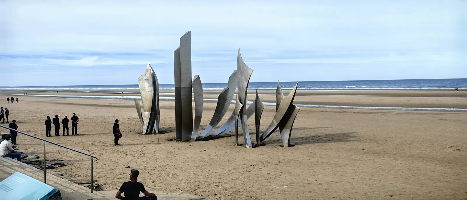 Les Braves stainless-steel sculpture on the sand of Omaha Beach at Saint-Laurent-sur-Mer