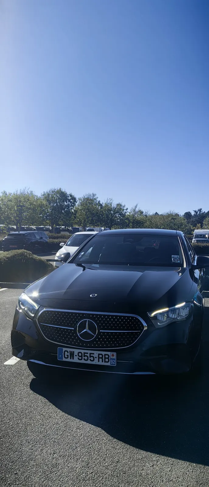 Our chauffeur-driven Mercedes E-Class at Colleville-sur-Mer on a Normandy day trip from Paris