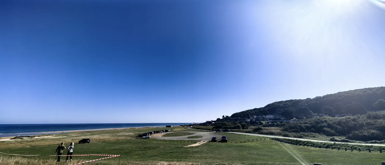 Panorama of Omaha Beach with the sand and the cliffs, Normandy