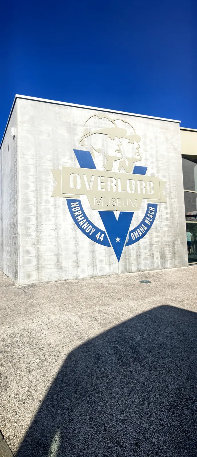 Overlord Museum facade at Colleville-sur-Mer with the Normandy 44 Omaha Beach logo