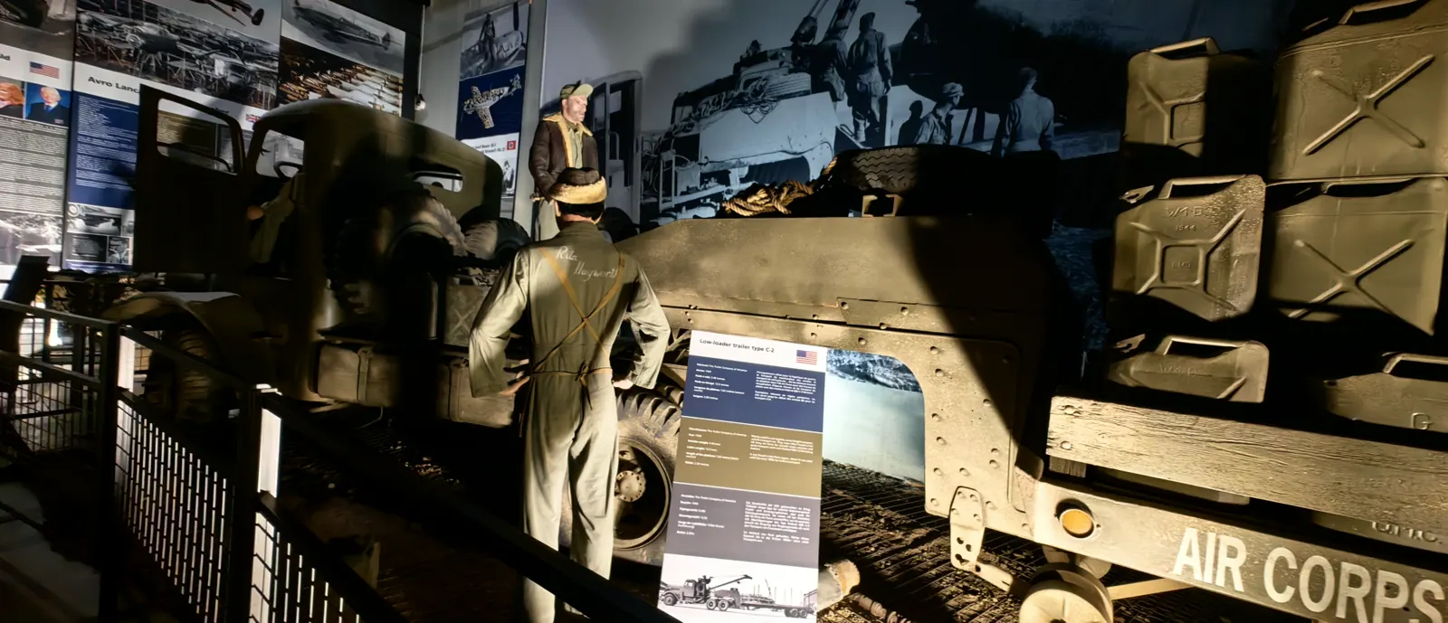 Trailer lettered Air Corps U.S. Army loaded with jerricans, part of a life-size scene at the Overlord Museum, Colleville-sur-Mer